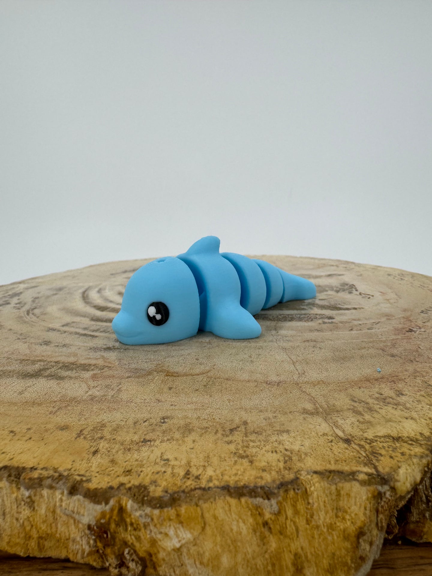 3D printed blue dolphin articulated mini figurine
